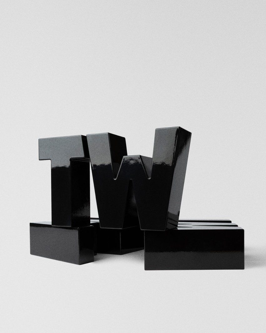 Troféu TextilWirtschaft Forum 2026 TW tipográfico preto